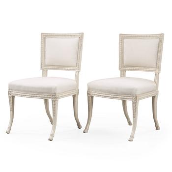 554. A pair of late Gustavian early 19th century chairs attributed to Ephraim Ståhl, master 1974.