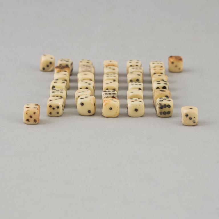 A set of 34 bone dice, 19th century.