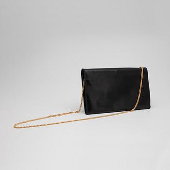 CÉLINE, a black leather evening bag.