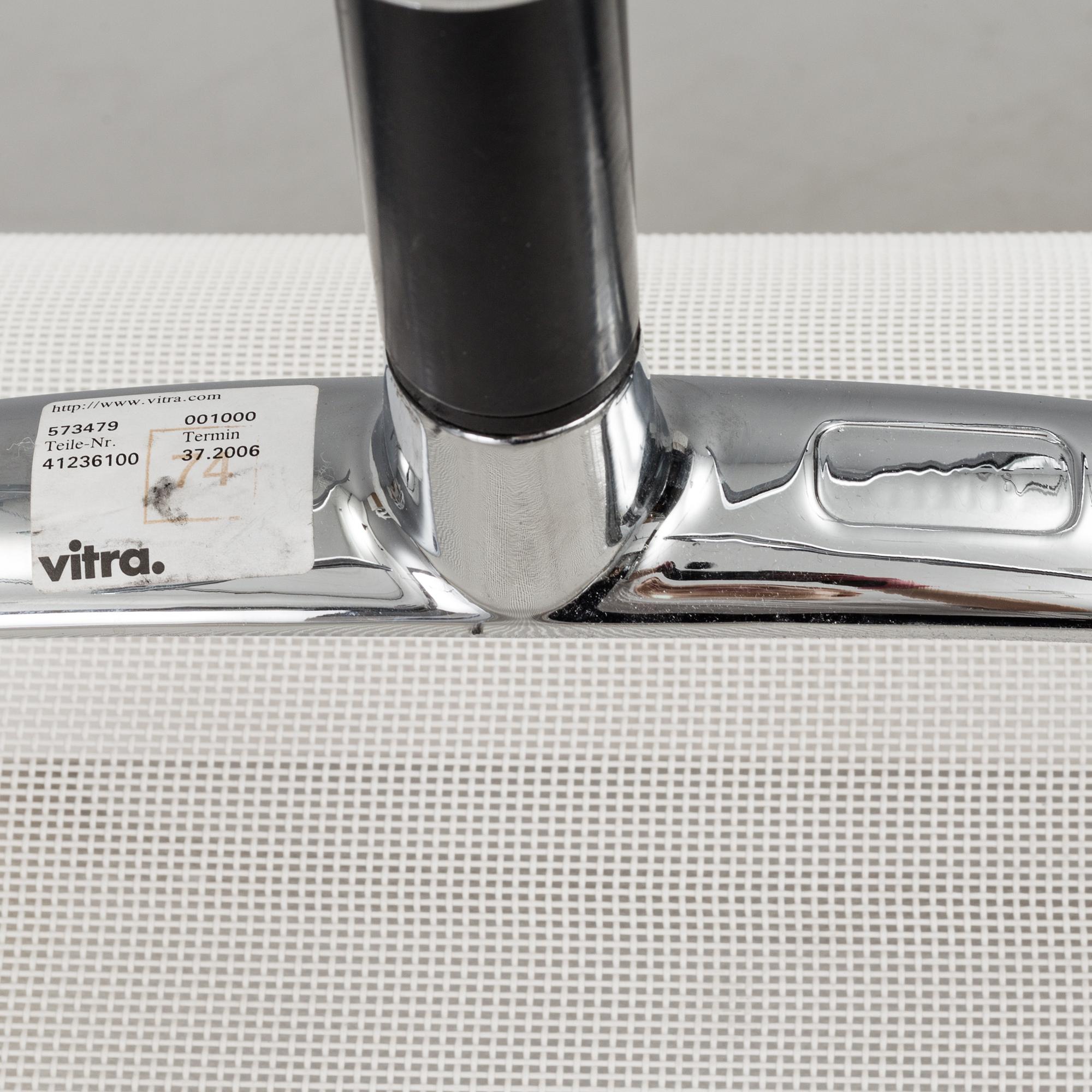 A pair of 'EA 108' desk chairs by Charles & Ray Eames for Vitra.