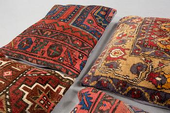 Six pillows made from rugs.