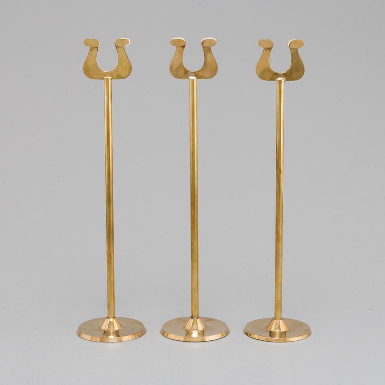 10 CARD STANDS, brass, 20th century.