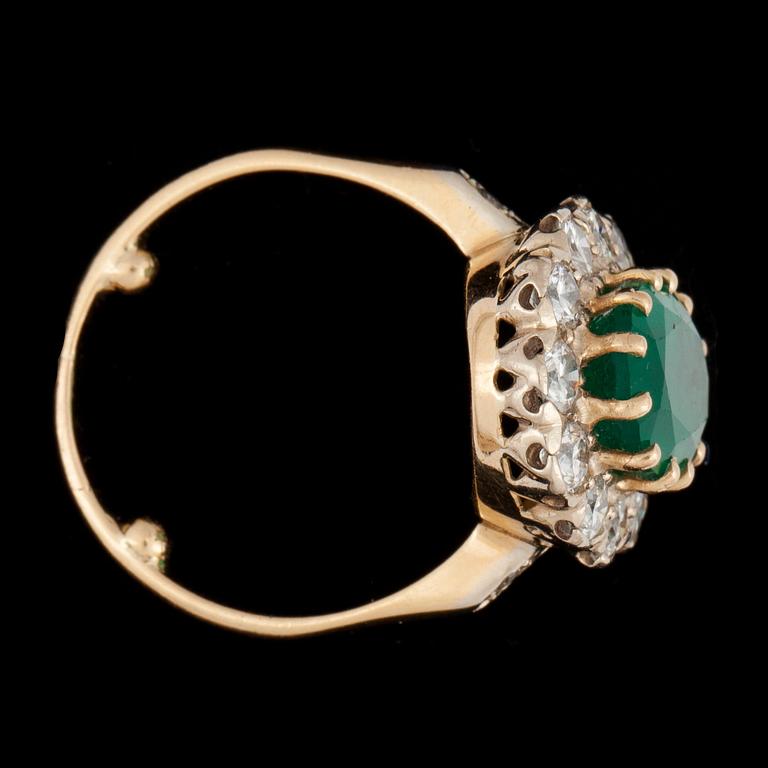 A emerald app. tot. 3.00 cts and diamond app. tot. 2.00cts ring.