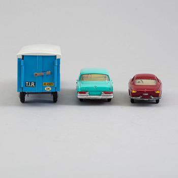 Three tin toy cars, Tekno Denmark, 1960s.