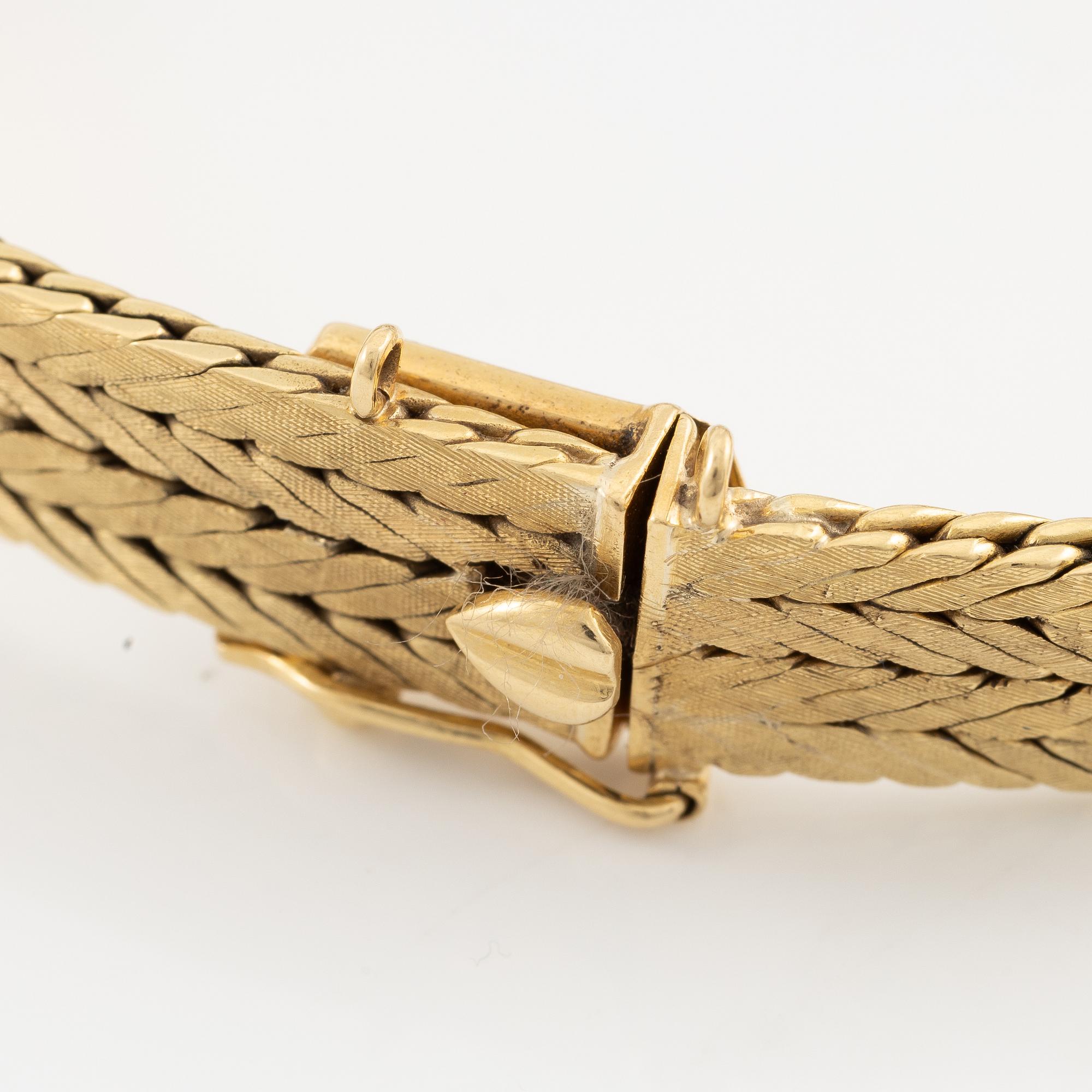 Armband 18K guld med rosa safirer och briljantslipade diamanter.