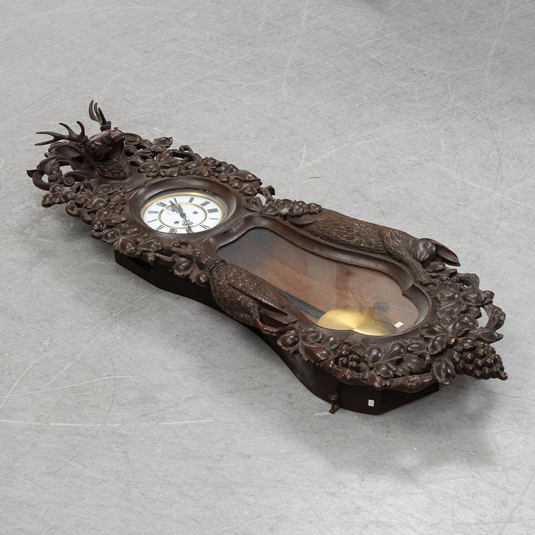 An Austrian or German wall pendulum clock, late 19th Century.