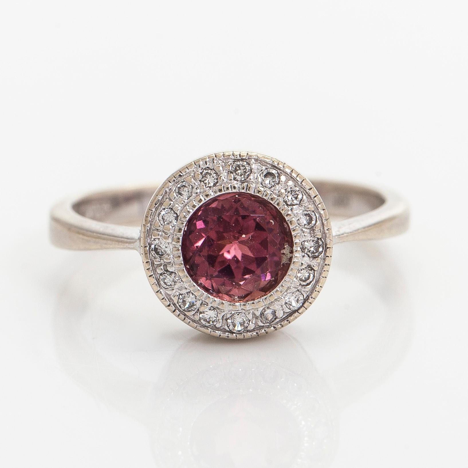 Ring, faceted cut tourmaline, brilliant cut diamonds, 14K white gold.