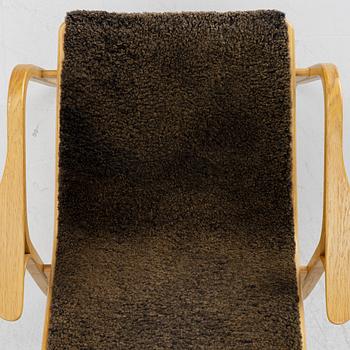 Yngve Ekström, a 'Lamino' armchair,  Swedese, 21st century.