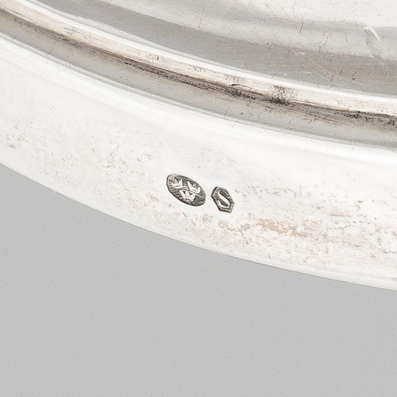 A pair of Rococo style sterling silver candelsticks, Swedish import mark.