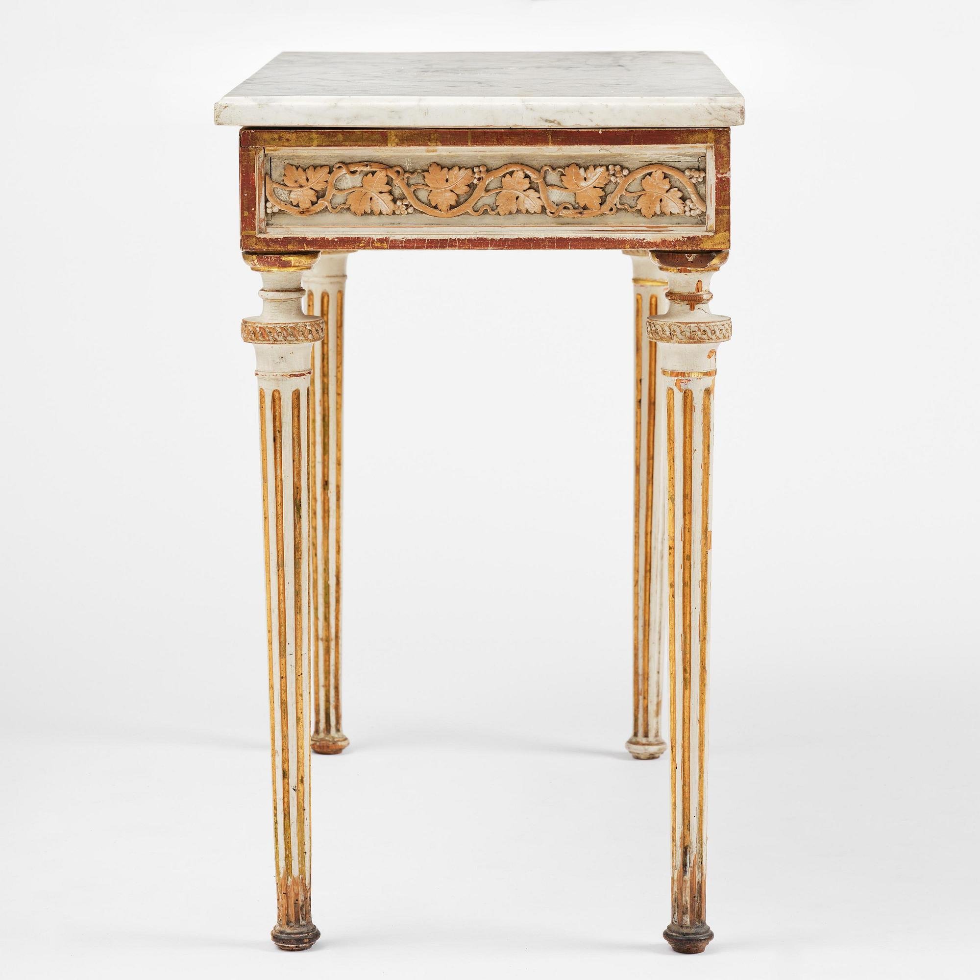 A late Gustavian carved giltwood and marble console table, attributed to P- Ljung (royal ornament carver 1788-1819).