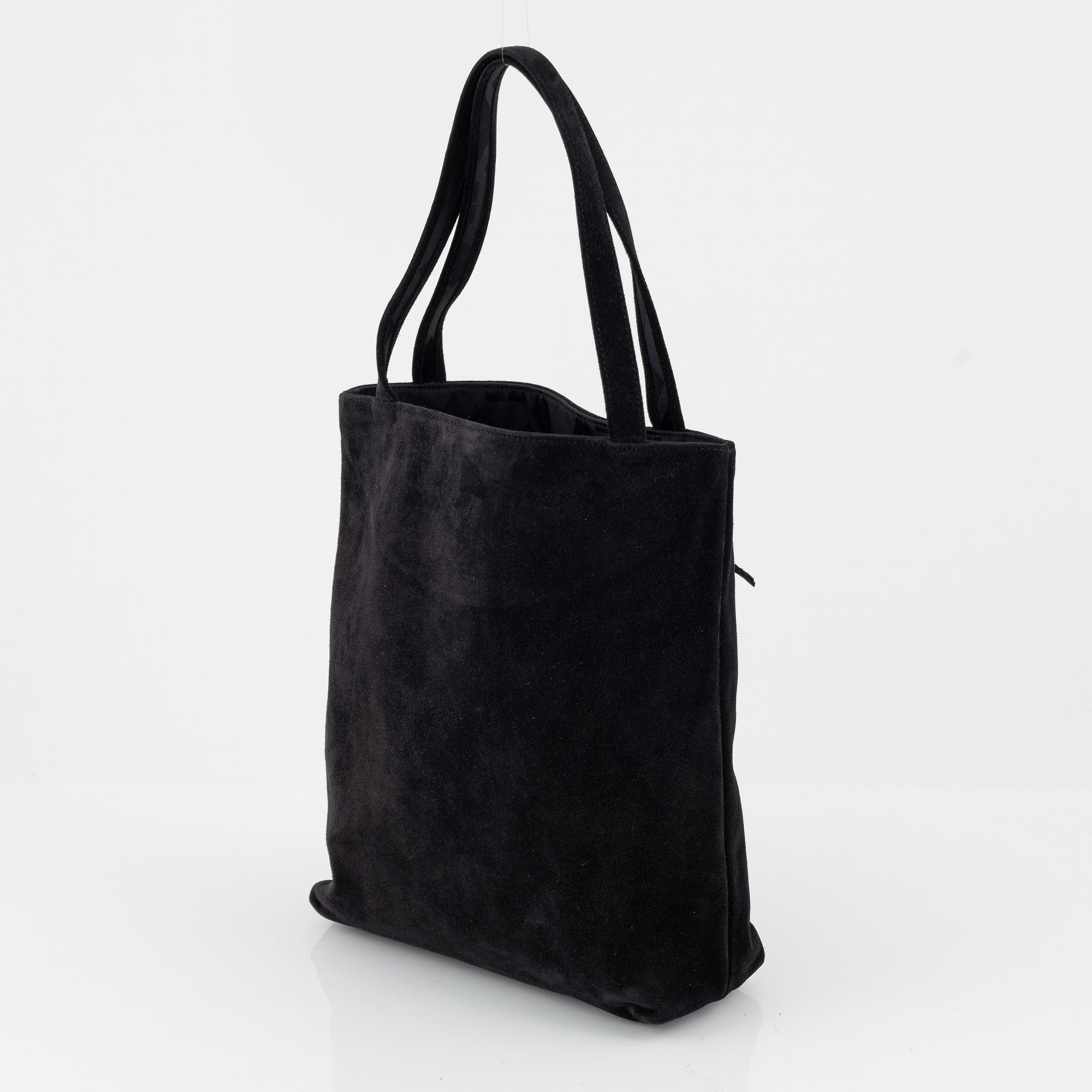 Givenchy, a black suede tote bag.