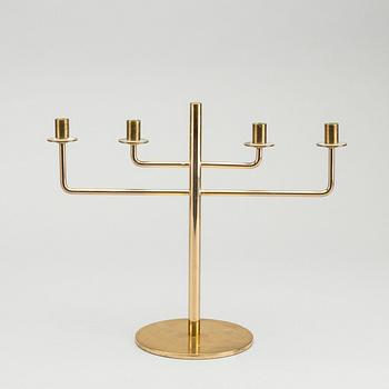 HANS-AGNE JAKOBSSON,  a brass candelabra, later part of the 20th century, height 23,5 cm.