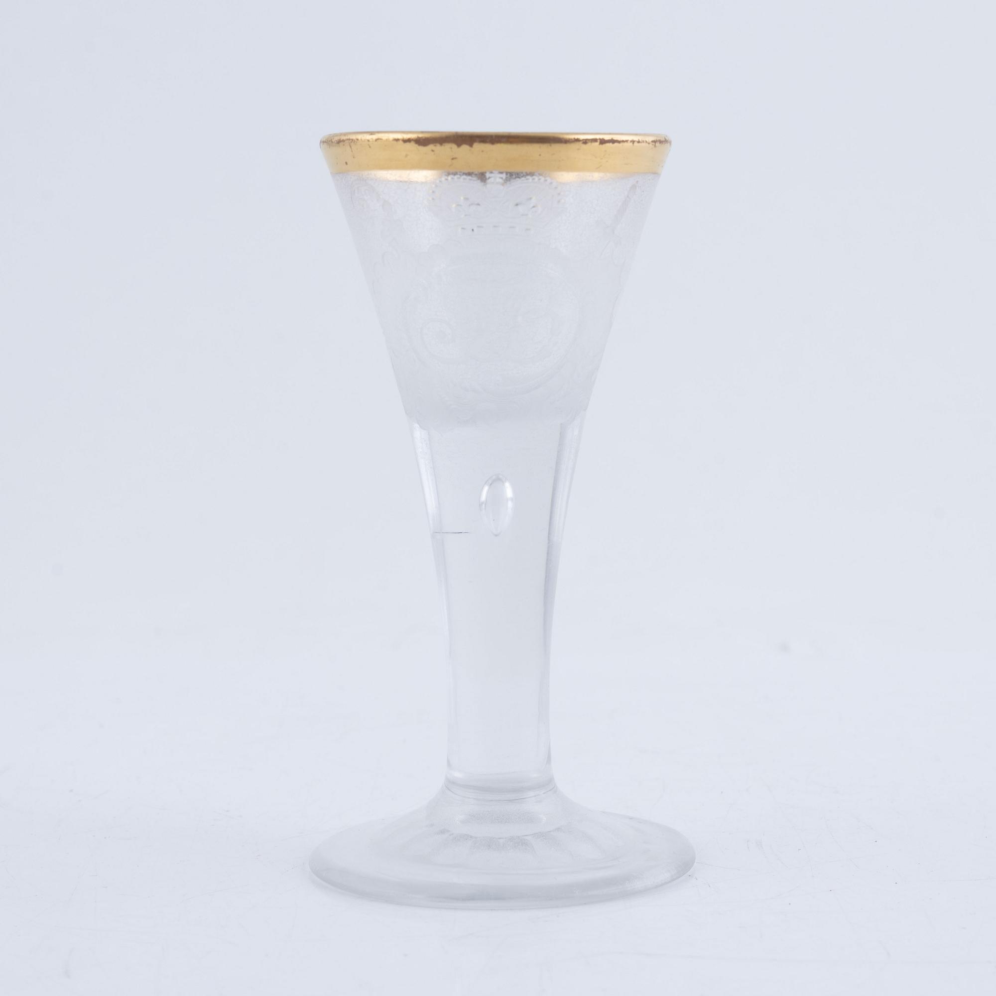 A presumably German engraved and gilt rococo glass, mid 18th century.