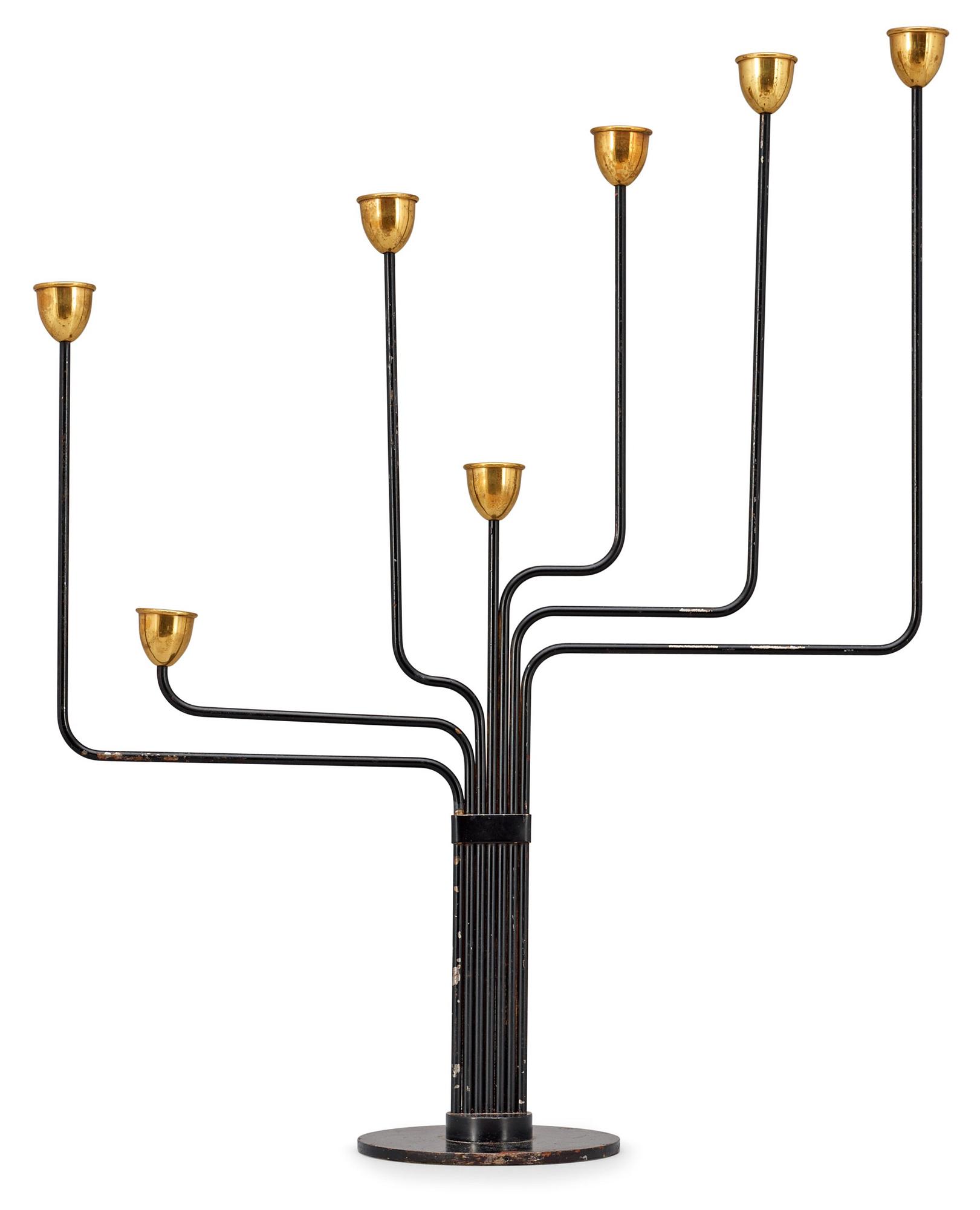 A Piet Hein brass and black lacquered metal candelabrum, 1950's-60's.