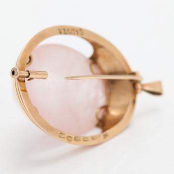 A 14K gold and rose quartz pendant. Kaunis koru, Helsinki 1960.