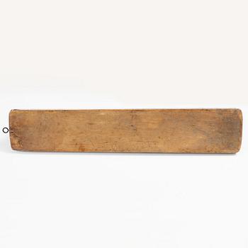 A carved and polychrome painted mangle board, Sweden, late 18th / early 19th century.
