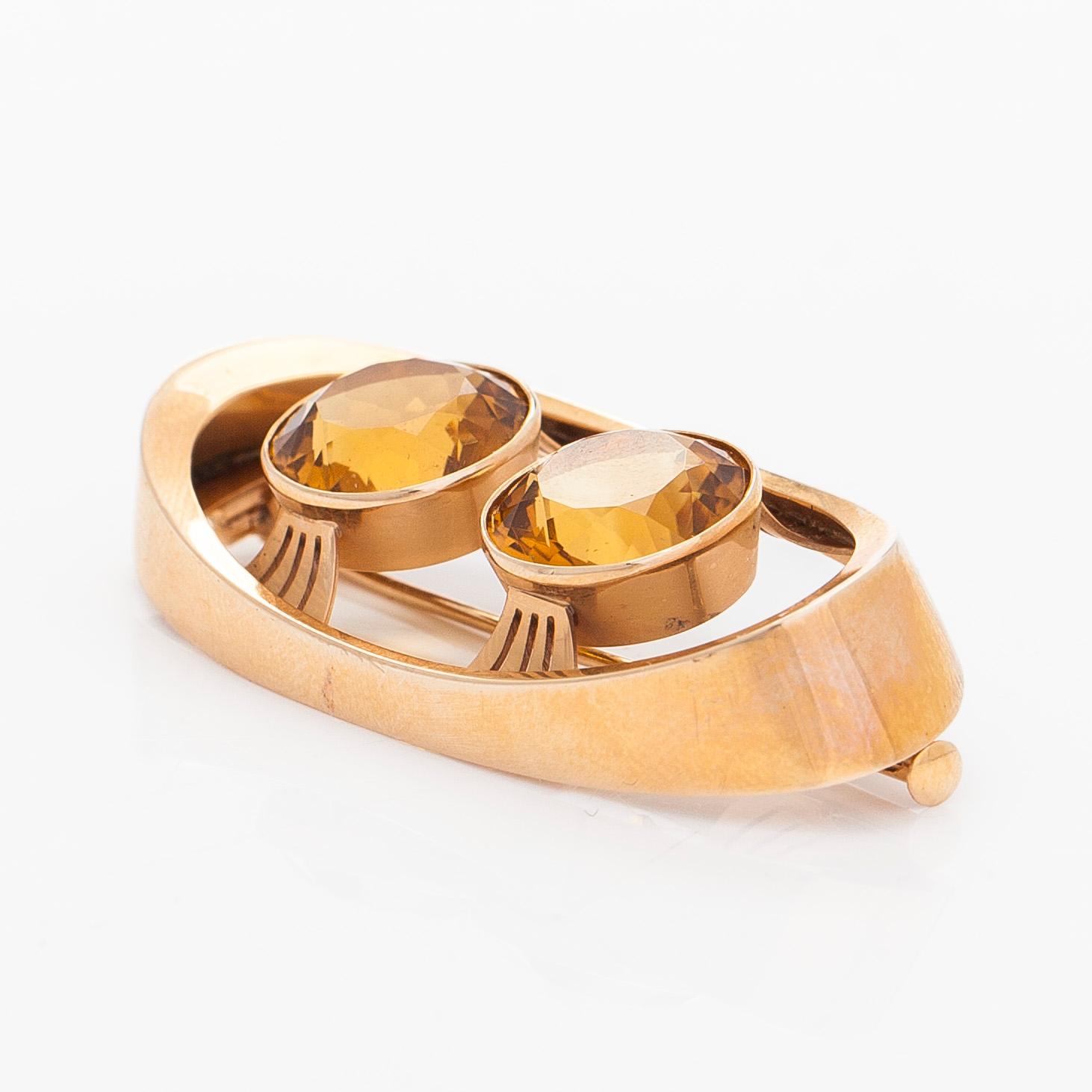 Brosch, 14K guld med citriner. Kaisaniemen Kello ja Kulta 1965.