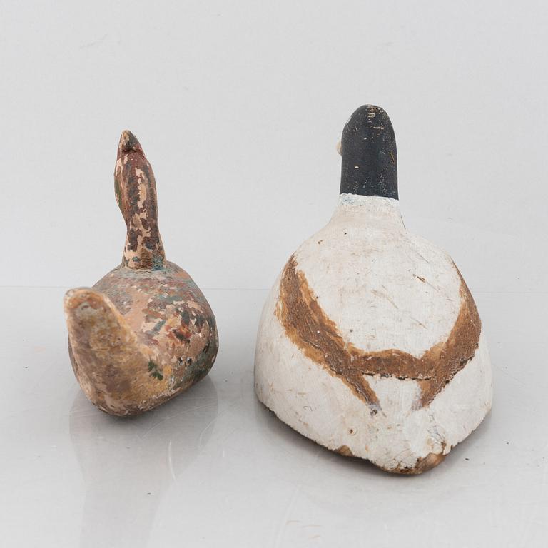 A set of six wooden duck decoys, 20th century.