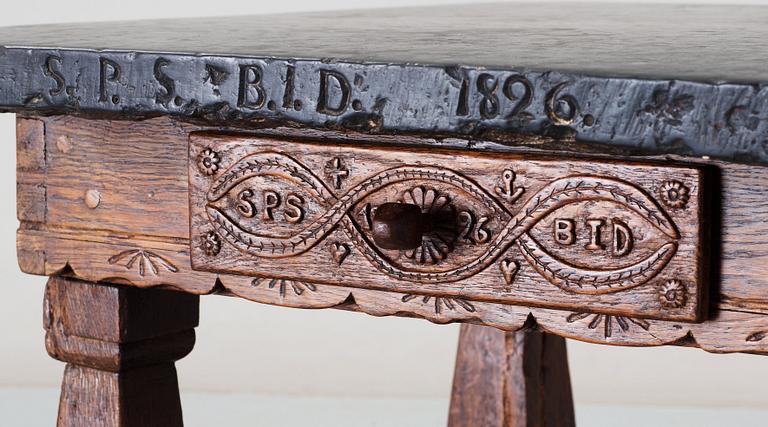 A Swedish stone top table dated 1826.