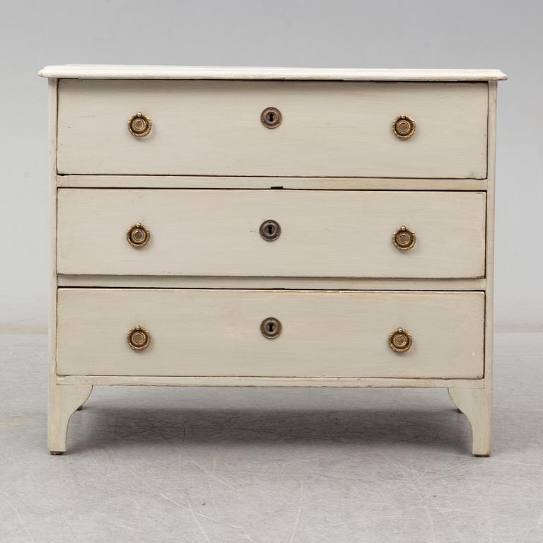 A mid 19th century painted chest of drawers.