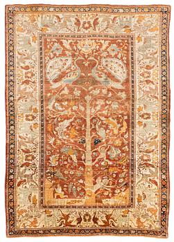 377. An antique silk Tabriz carpet, north west Persia, c 239 × 168 cm.