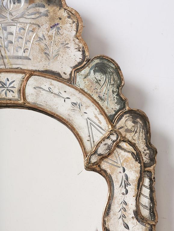 A Northern European late baroque mirror, mid 18th century.