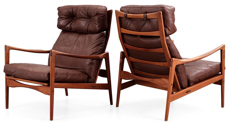 A pair of Ib Kofod Larsen teak and brown leather easy chairs, OPE Möbler, Sweden 1960's.