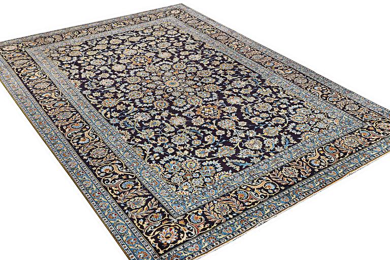 A Keshan carpet, c. 350 x 250 cm.