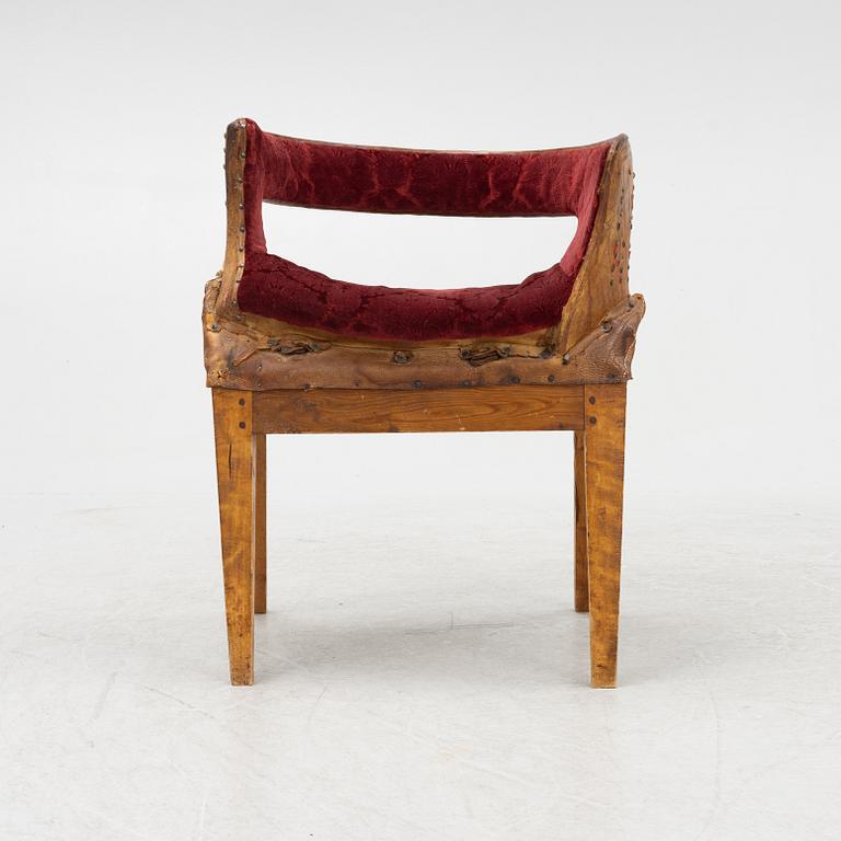 A side saddle, 18th/19th Century, mounted on legs.