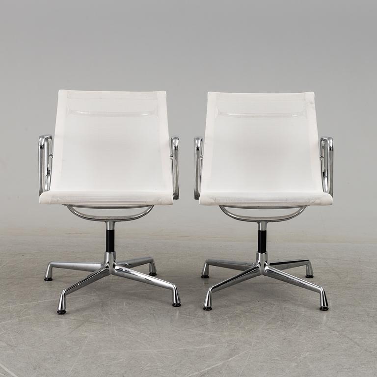 A pair of 'EA 108' desk chairs by Charles & Ray Eames for Vitra.