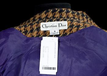 A chequered tweed jacket by Christian Dior.