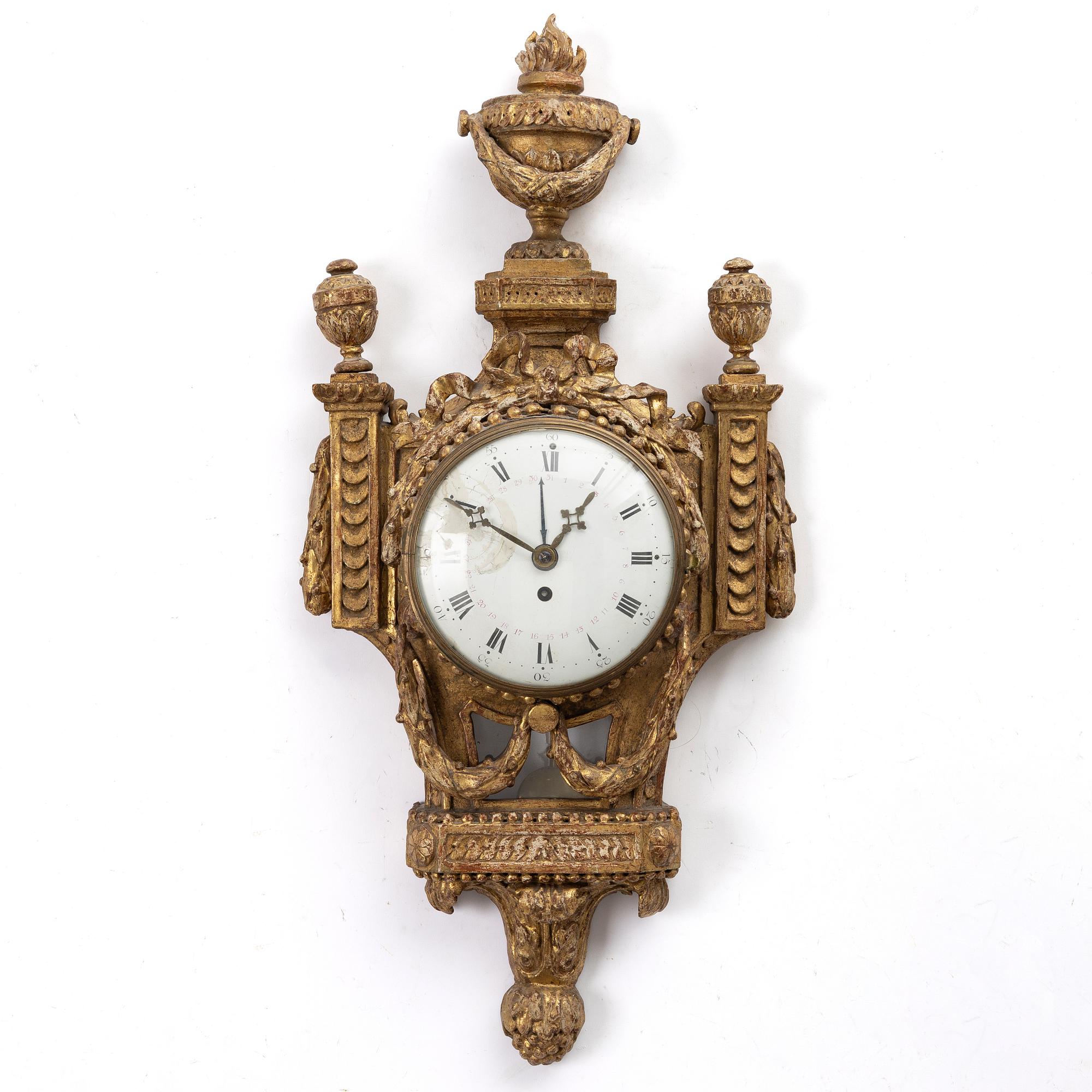 An Austrian Louis XVI giltwood cartel clock by J. Bentele (watchmaker in Salzburg ca 1780).