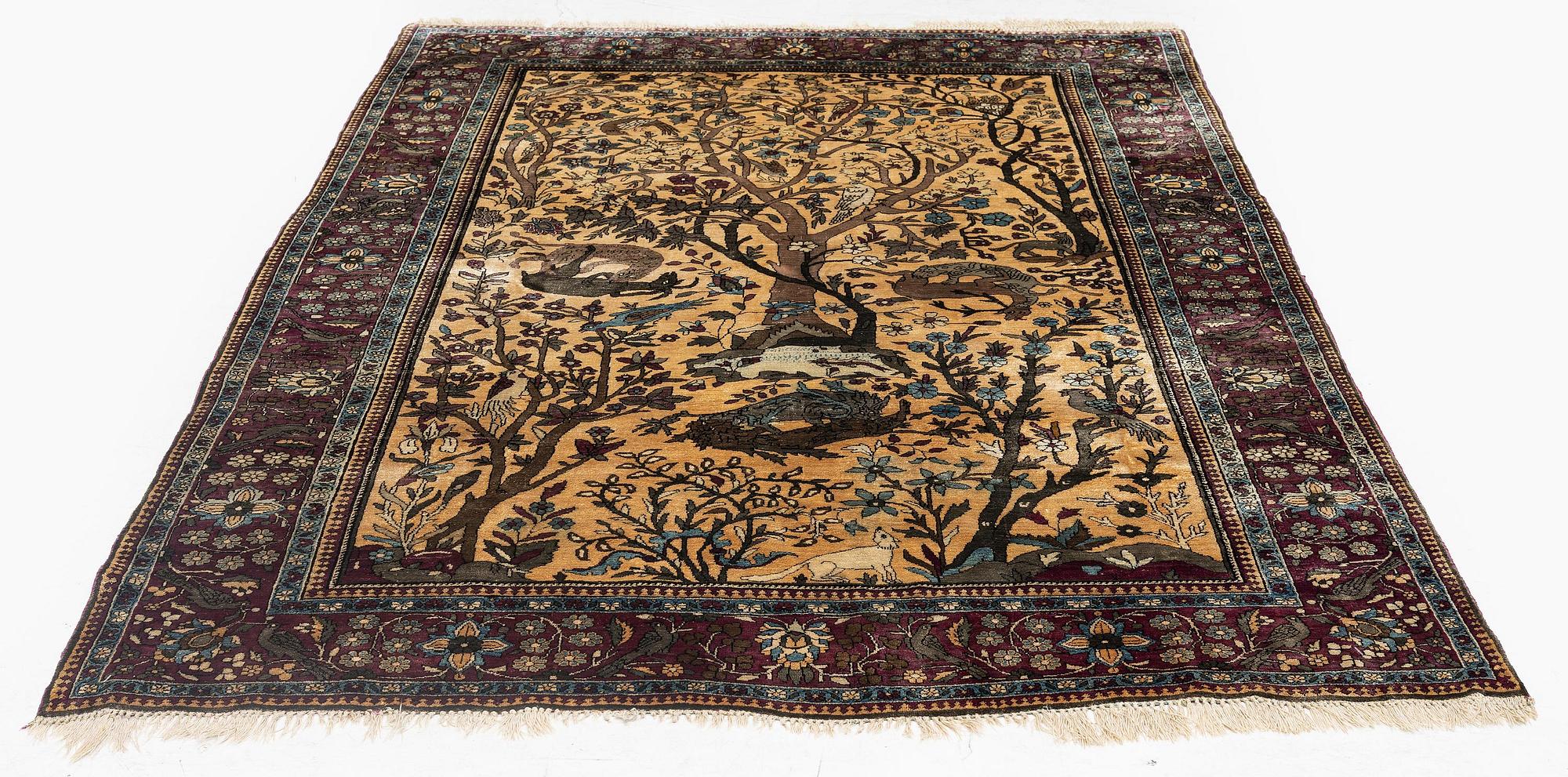 A pictoral silk Kashan 'Mohtasham' rug, c. 195 x 130 cm.