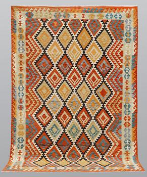 A carpet, kilim, ca 304 x 210 cm.