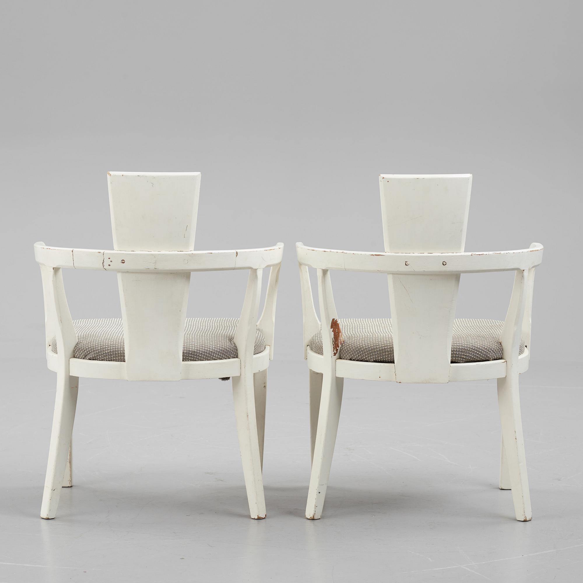 A pair of painted armchairs, first half of the 20th Century.
