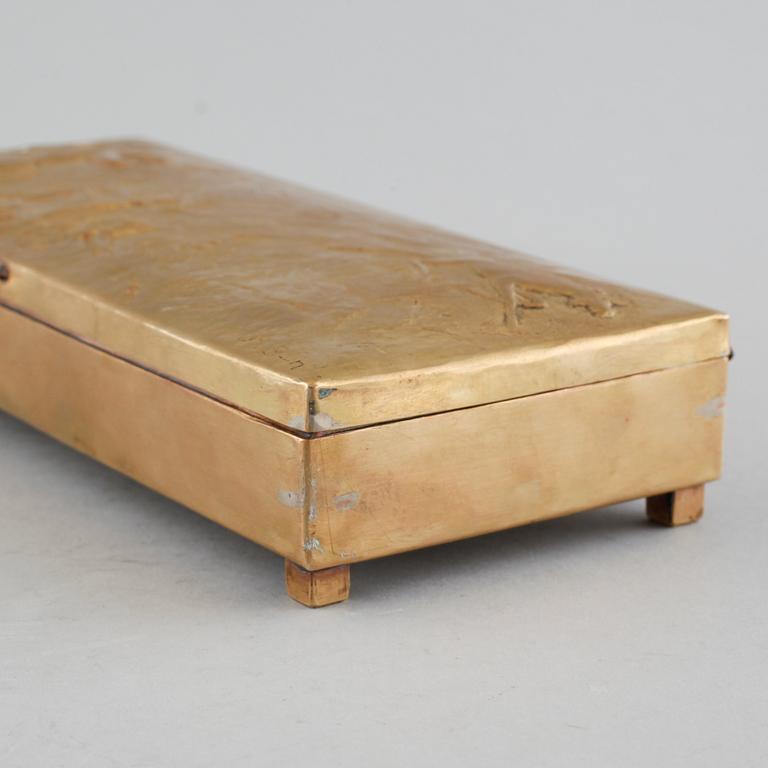 A brass coated copper cigarbox dated 1942 and signed B.S-n.