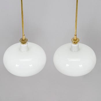 Paavo Tynell, a pair of mid-20th century 'K2-19' pendant lights for Idman.