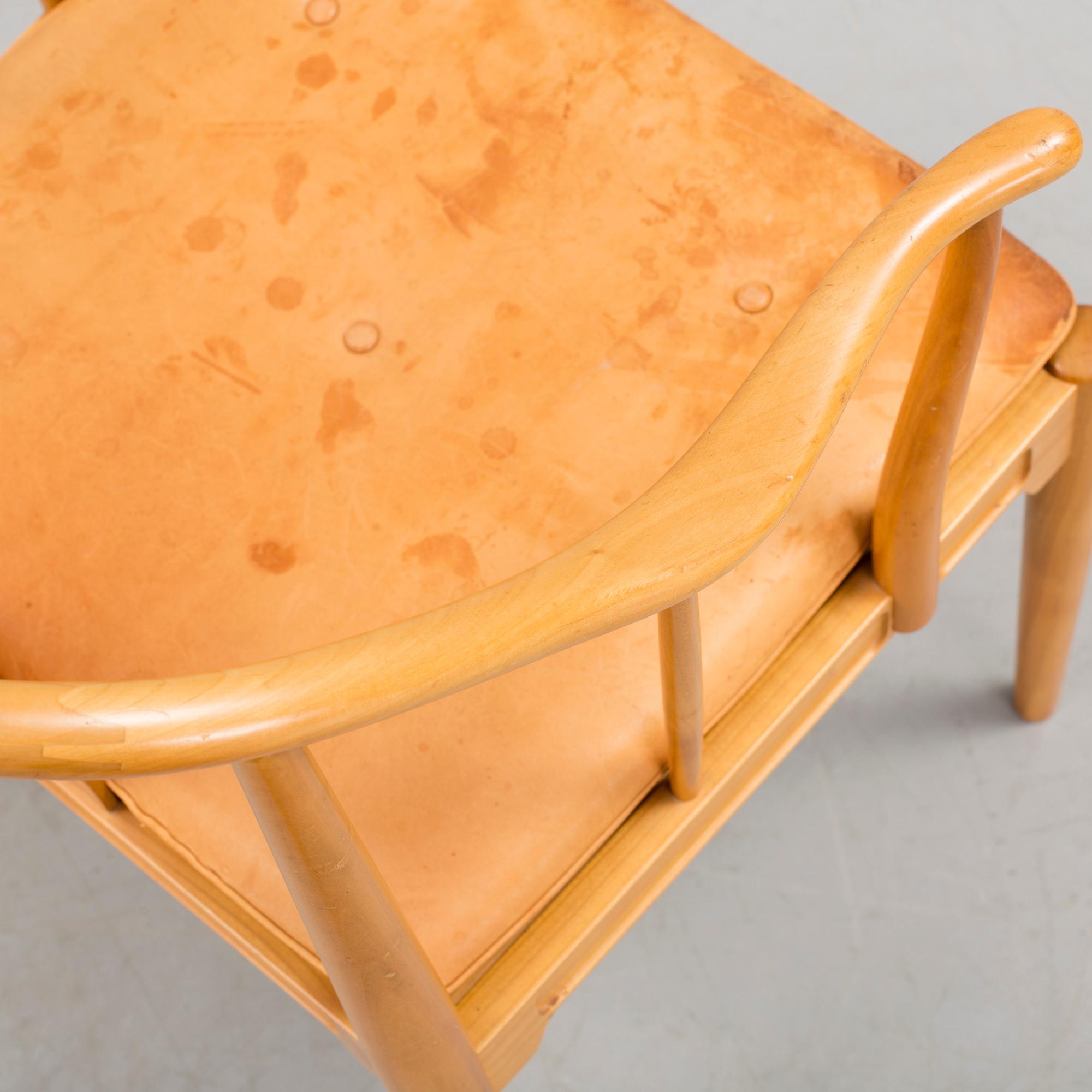 A Hans J Wegner 'Kinastolen' armchair, Fritz Hansen, Denmark 1971.