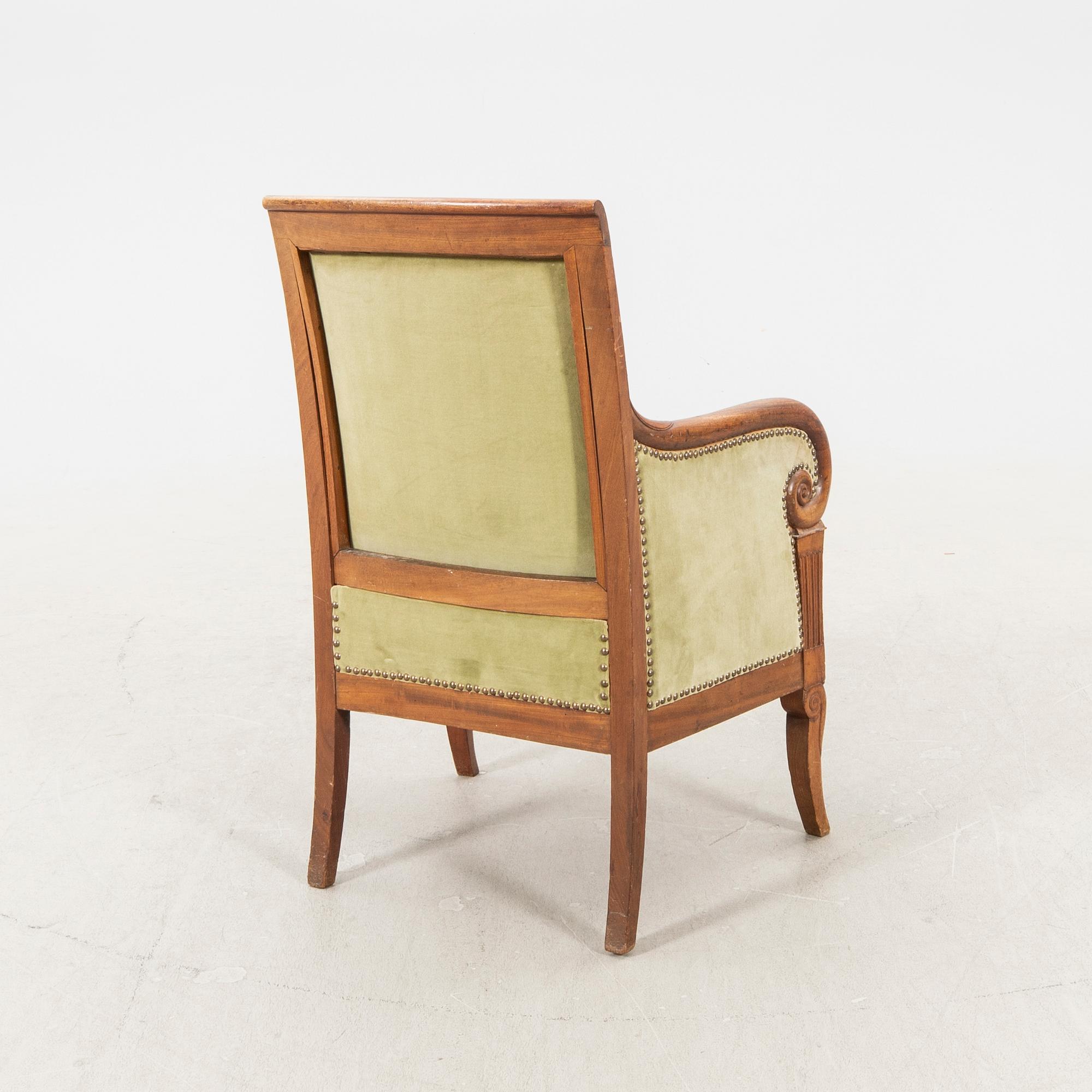 A mid 1800s mahogany bergere.