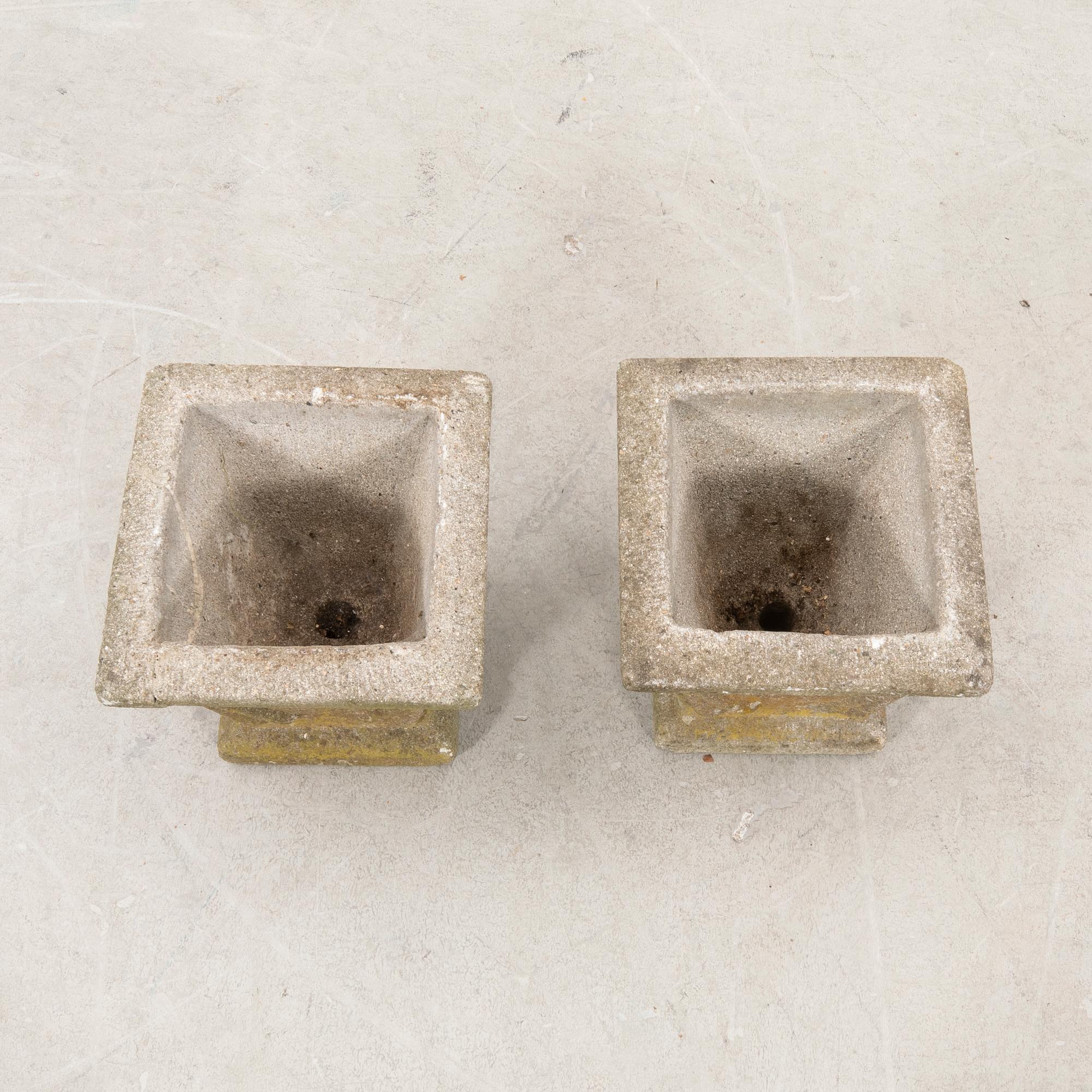 A pair of concrete garden pots middle of the 20th century.