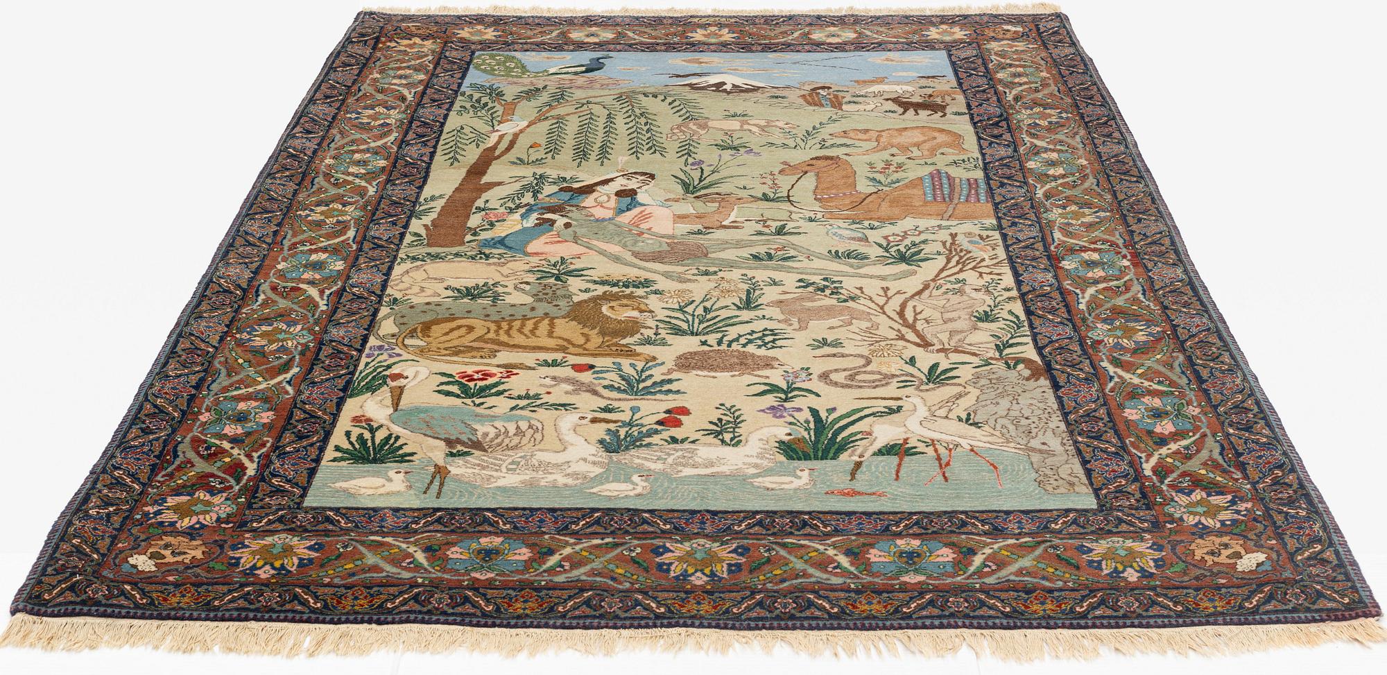 A carpet, semi-antique, Tabriz, signed, ca 271 x 175 cm.