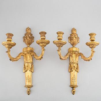 A pair of Louis XVI style 19th century appliquer.