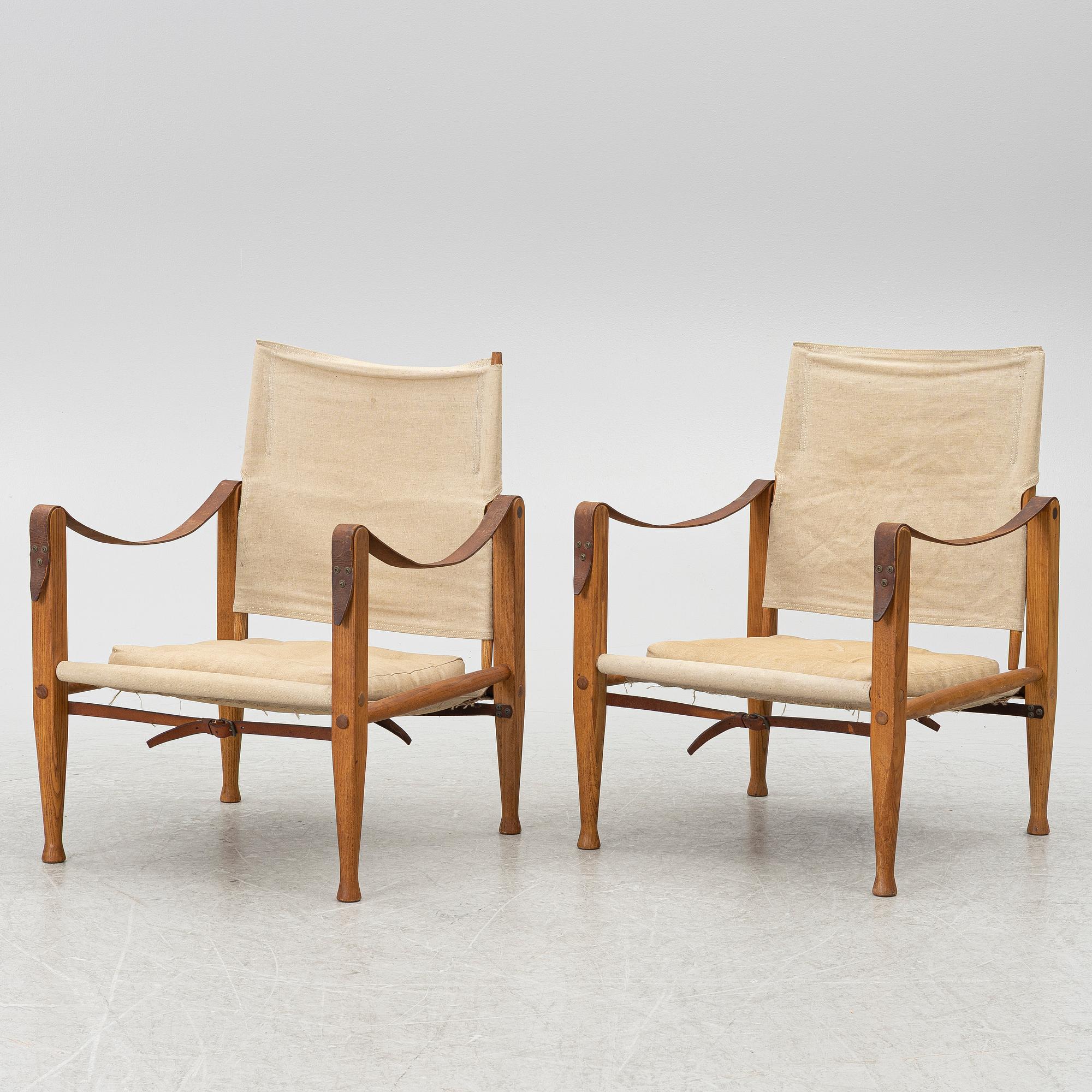 Kaare Klint, A pair of 'Safari' armchairs, Rud. Rasmussen's Snedkerier, Denmark, second half of the 20th century.