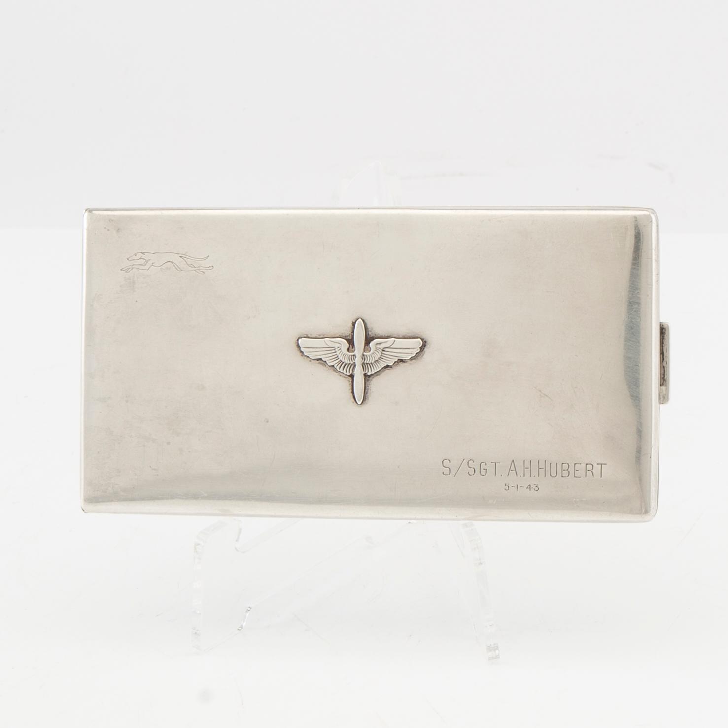 American silver cigarette case with engraving from World War II.