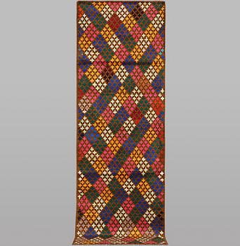 An Afghan runner carpet, c. 288 x 83 cm.