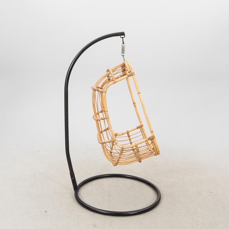 A bamboo and rattan hanging chair from the second half of the 20th century.