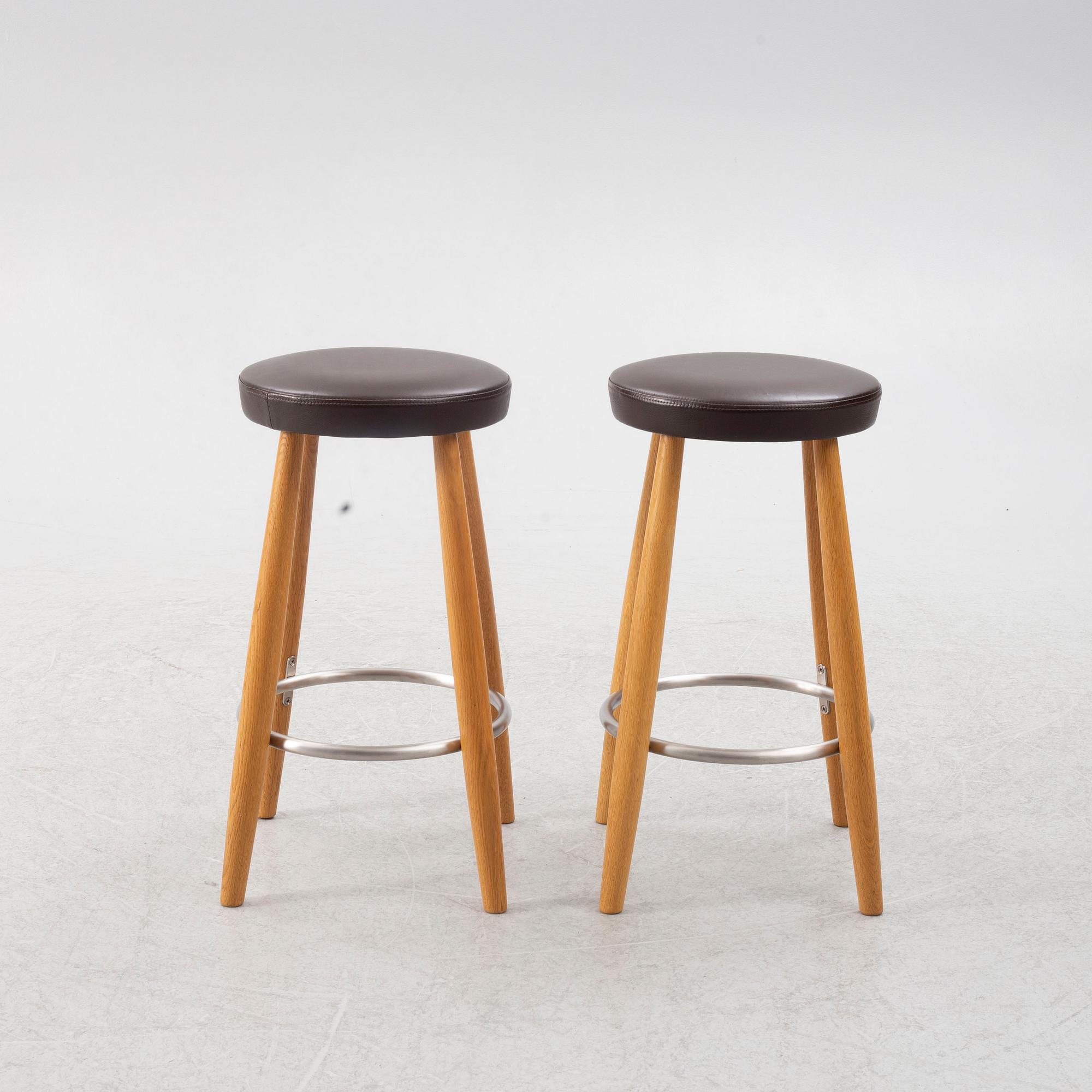 Hans J. Wegner, a pair of bar stools, CH 58, Carl Hansen & Son, Denmark, 21st century.