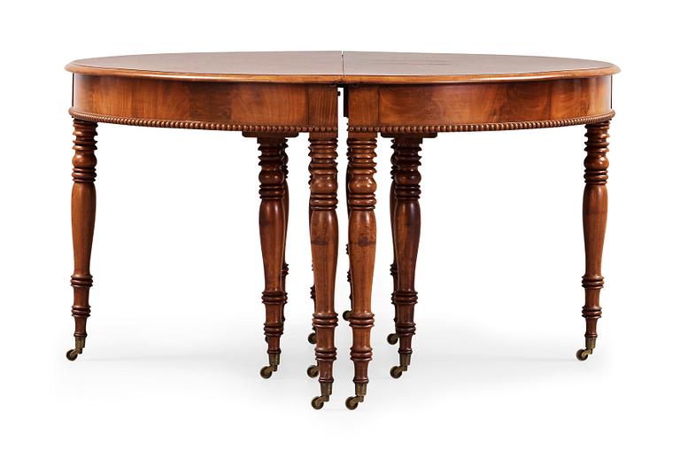 A Swedish late Empire 19th century dinner table.
