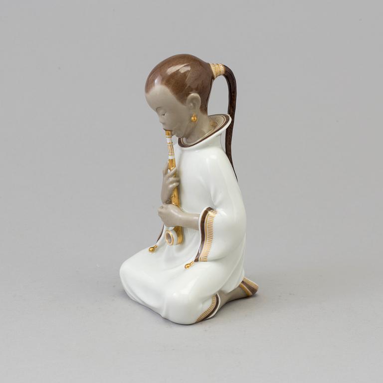 An Arno malinowski porcelain figure 'Opiumsmoker', for Royal Copenhagen, Denmark, 1920s.