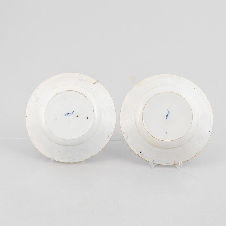 A pair of Peacock pattern earthenware plates, presumably De Klauw, The neatherlands, around 1800.